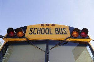 Traditional yellow school bus on the street