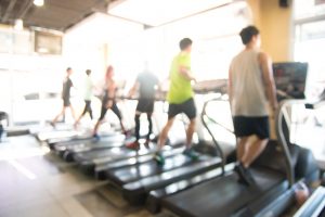 Blur abstract background tracking machine in fitness center.